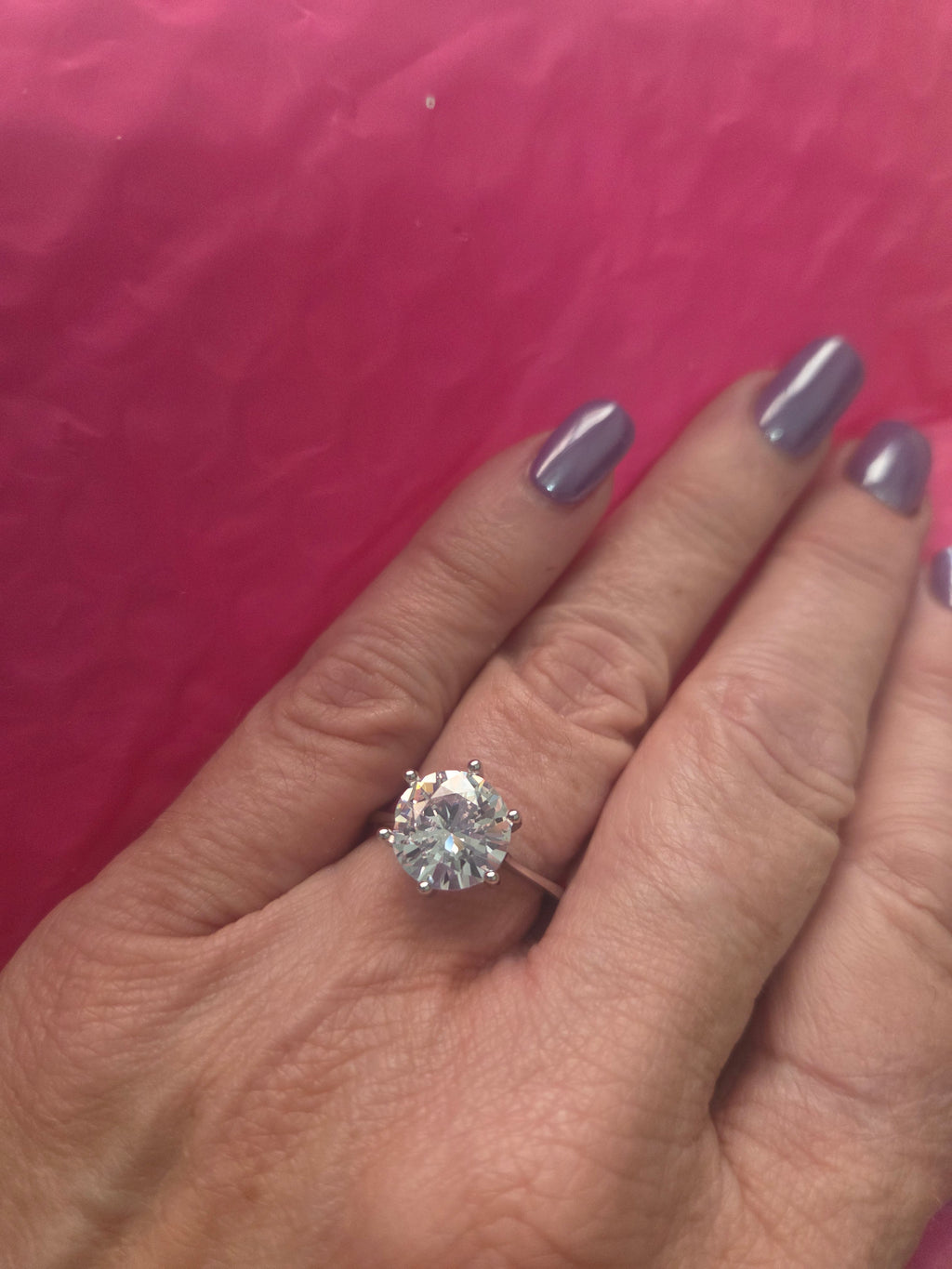 5 carat Moissanite solitaire set in sterling silver. Size 9