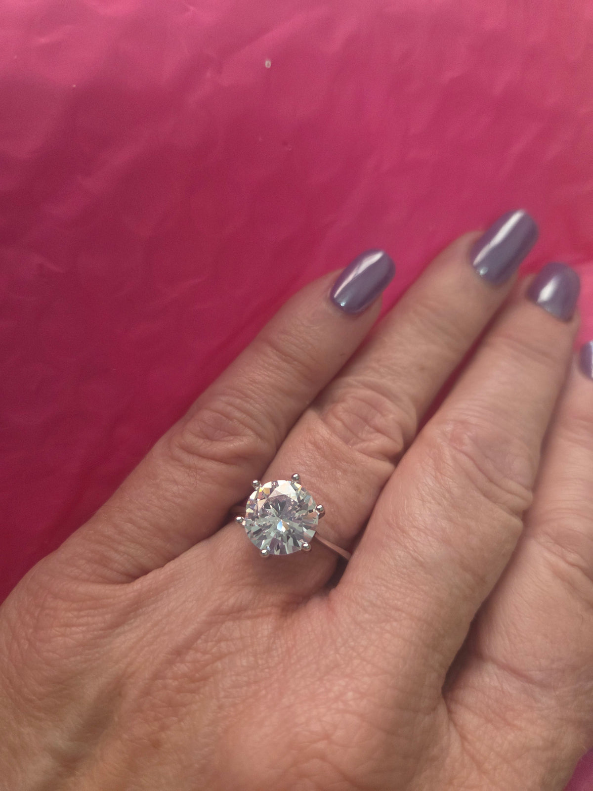5 carat Moissanite solitaire set in sterling silver. Size 9