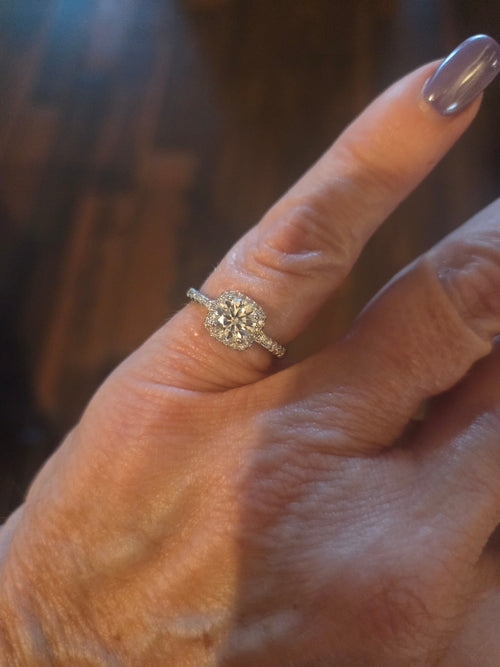 1.5 carat round halo with pave setting